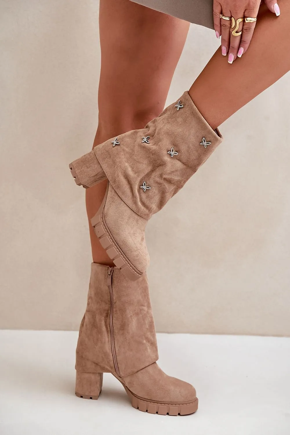 Women decorated turned-up upper heel boots